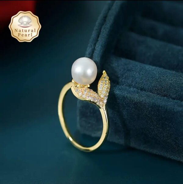 Gold-plated ring with genuine natural pearl.