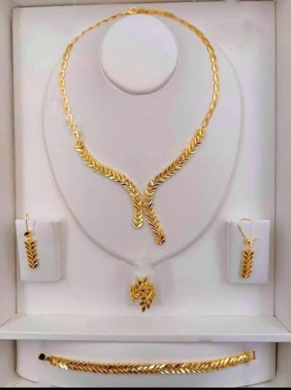 Set of necklace, earrings, and Ring plated with 21-karat gold.